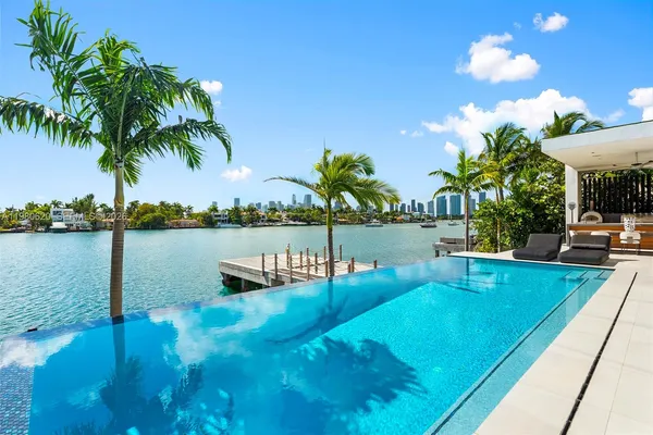 a view of a lake with a building in the background