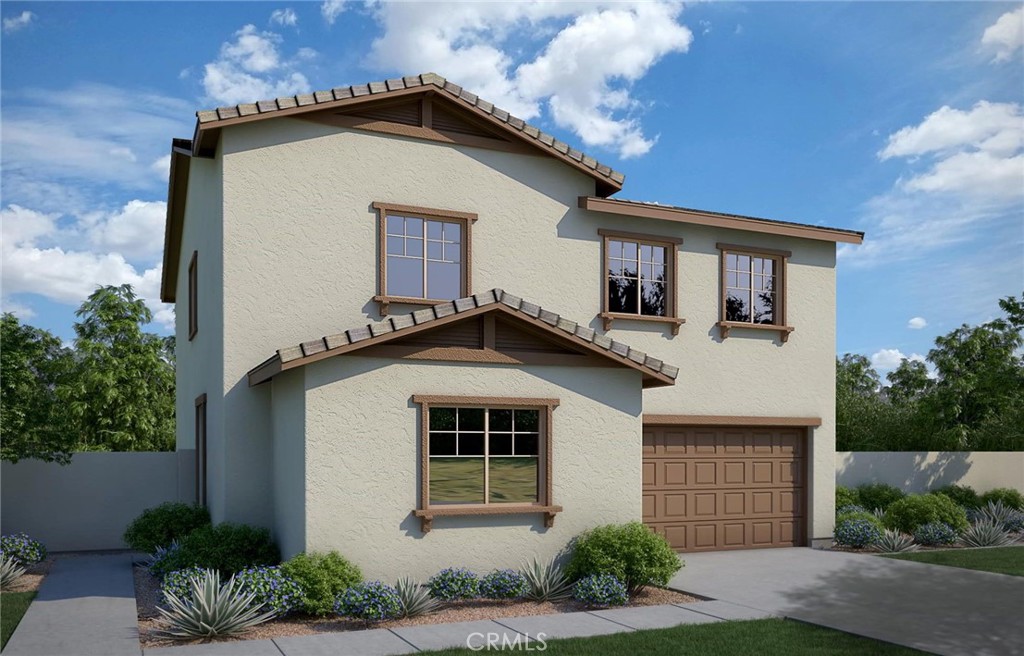5458 Indigo Way Banning, CA 92220 - Photo 1 of 3 a front view of a house with a yard