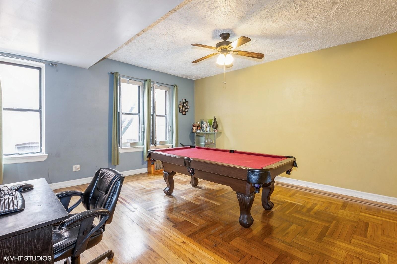 1670 Longfellow Avenue, Unit 6J Bronx, NY 10460 - Photo 2 of 15 a room with pool table and windows
