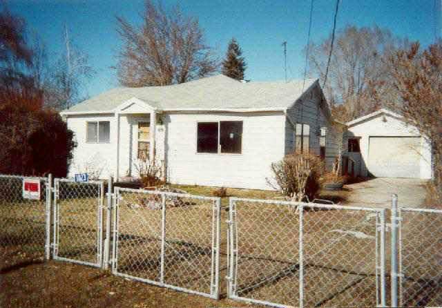 3501 Lombard Loop Road Zillah, WA 98953 - Photo 1 of 1 a front view of a house with street
