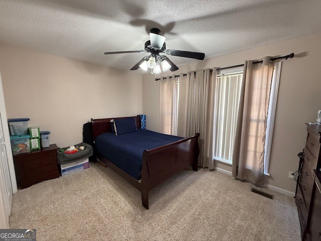 1407 Red Fox Trail, Unit 4 Tifton, GA 31793 - Photo 17 of 30 a living room with furniture and a chandelier