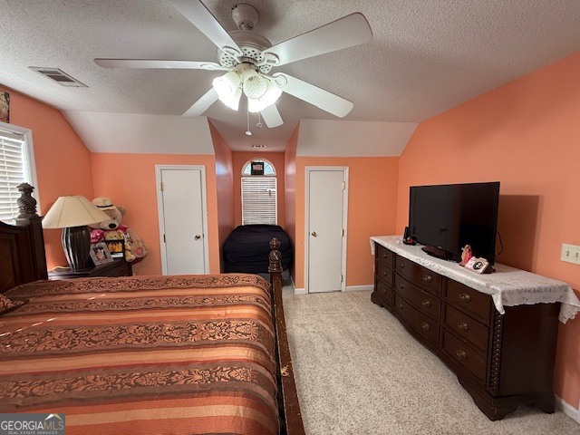 1407 Red Fox Trail, Unit 4 Tifton, GA 31793 - Photo 19 of 30 a bedroom with a bed and a flat screen tv