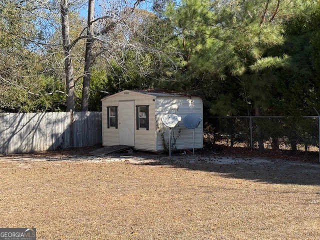 1407 Red Fox Trail, Unit 4 Tifton, GA 31793 - Photo 29 of 30 a view of a house with a yard