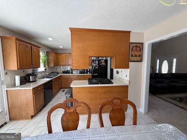 1407 Red Fox Trail, Unit 4 Tifton, GA 31793 - Photo 10 of 30 a kitchen with stainless steel appliances granite countertop a refrigerator a stove top oven and white cabinets