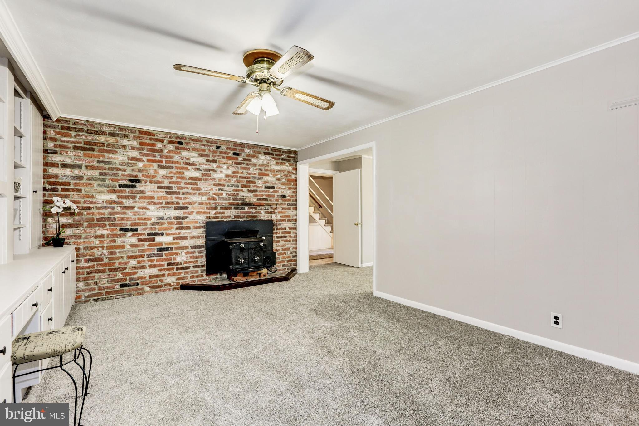 18112 Muncaster Road Rockville, MD 20855 - Photo 26 of 35 4th Bedroom Sitting Room with Fireplace Insert