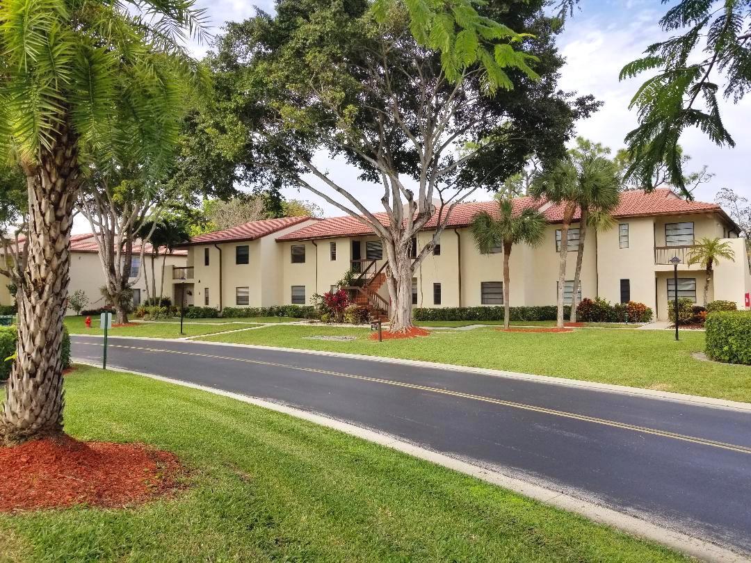 21856 Arriba Real, Unit 5D Boca Raton, FL 33433 - Photo 1 of 34 BOCA LAGO FRONT BLDG
