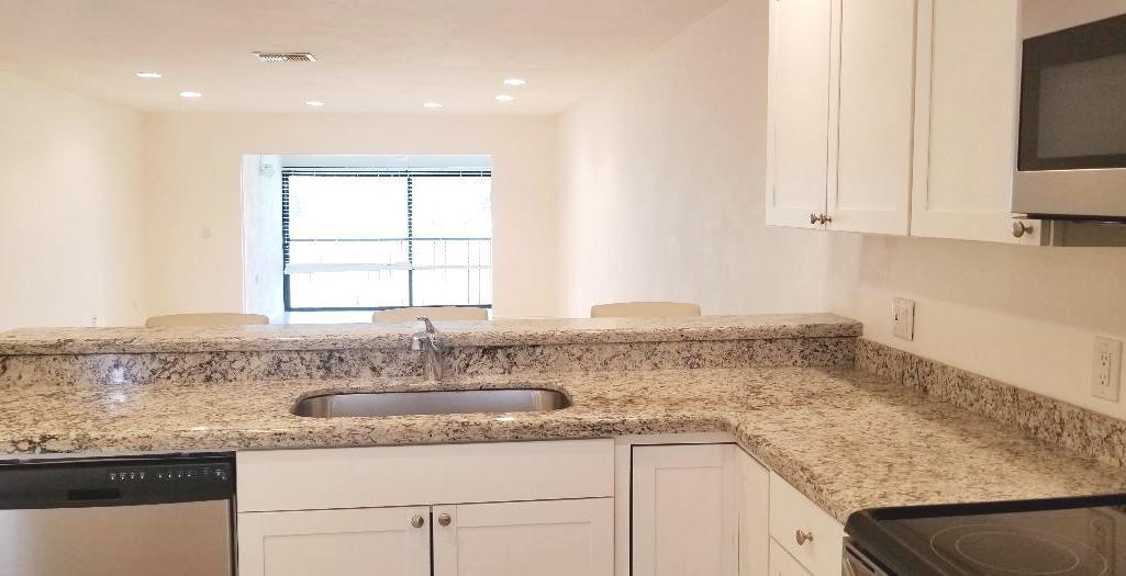 21856 Arriba Real, Unit 5D Boca Raton, FL 33433 - Photo 13 of 34 Boca Lago - Kitchen Open
