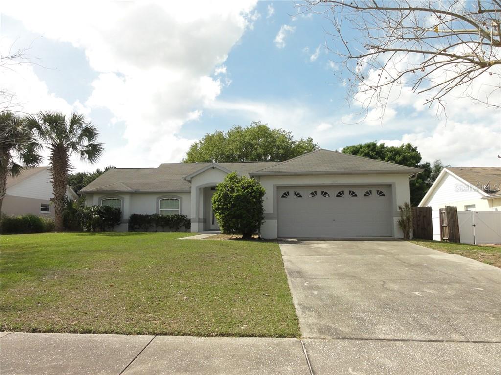 14615 Indian Ridge Trail Clermont, FL 34711 - Photo 1 of 1 a view of a house with a yard