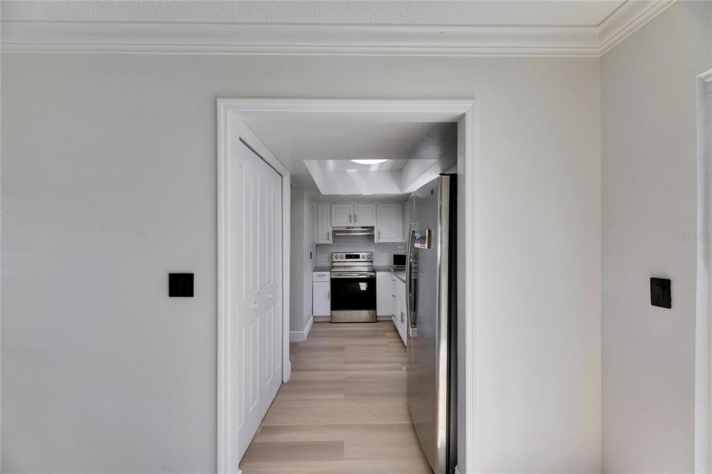 564 Florida Circle South Apollo Beach, FL 33572 - Photo 18 of 46 a view of a hallway with kitchen and sink