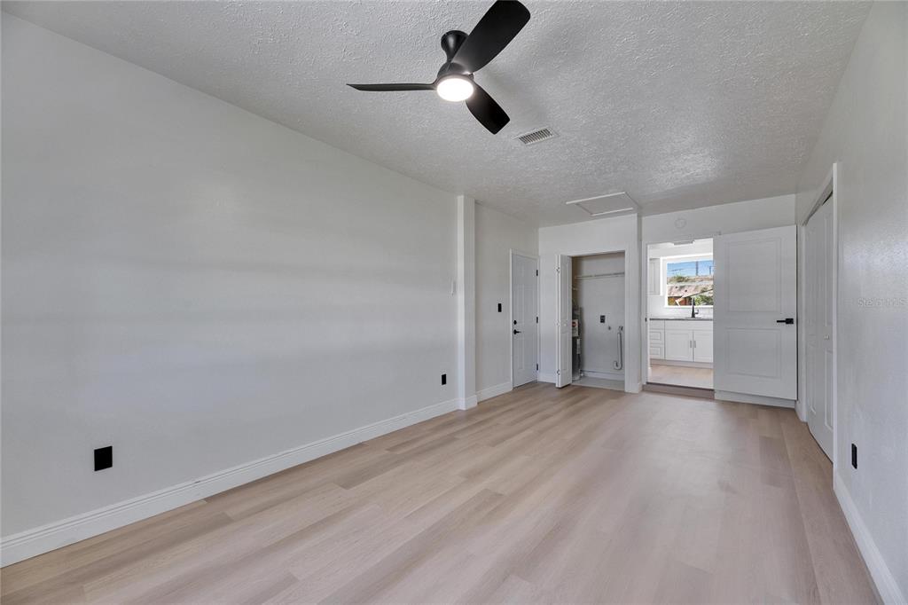 564 Florida Circle South Apollo Beach, FL 33572 - Photo 26 of 46 wooden floor in an empty room