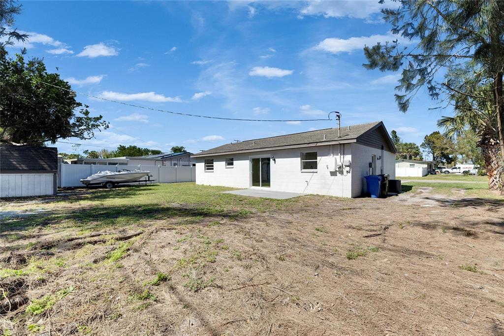 564 Florida Circle South Apollo Beach, FL 33572 - Photo 45 of 46 a view of a house with a yard