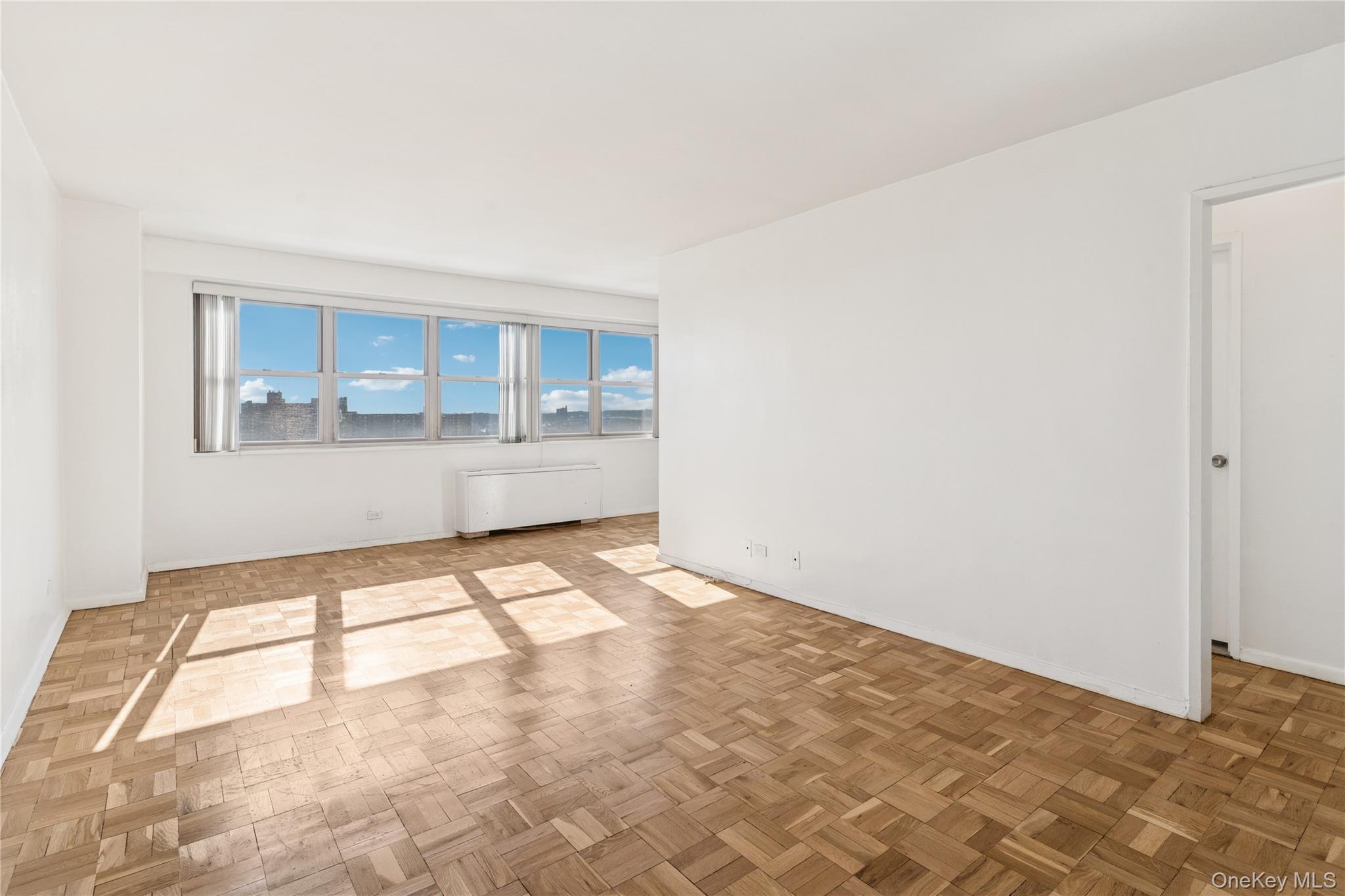 102-10 66th Road, Unit 20G Queens, NY 11375 - Photo 3 of 15 Living/Dining Area with a Bright view to be Desired!