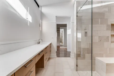 a bathroom with a sink a toilet and a bathtub