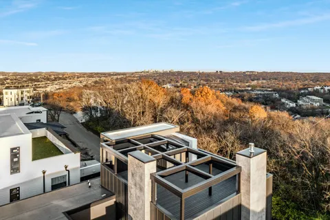 an aerial view of residential house with outdoor space