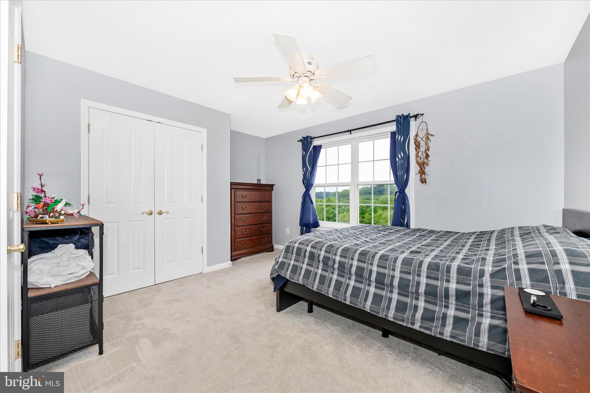 9855 McKinstry Mill Road New Windsor, MD 21776 - Photo 45 of 76 a bedroom with a bed and a window