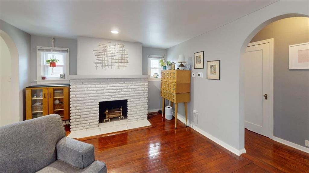 568 Lougeay Road Pittsburgh, PA 15235 - Photo 12 of 30 Living room, decorative fireplace
