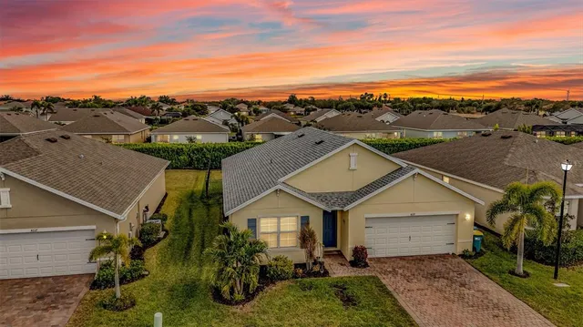 a view of a hallway with a chandelier