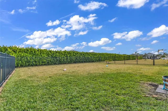 a kitchen with a sink cabinets and stainless steel appliances