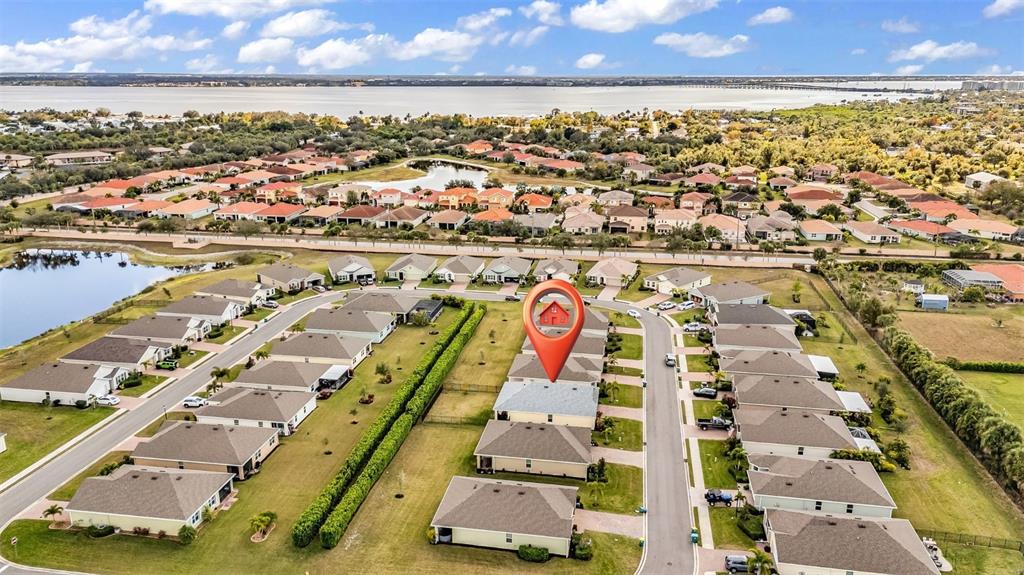 4219 Manatee Lane Punta Gorda, FL 33980 - Photo 40 of 56 an aerial view of residential building with parking space