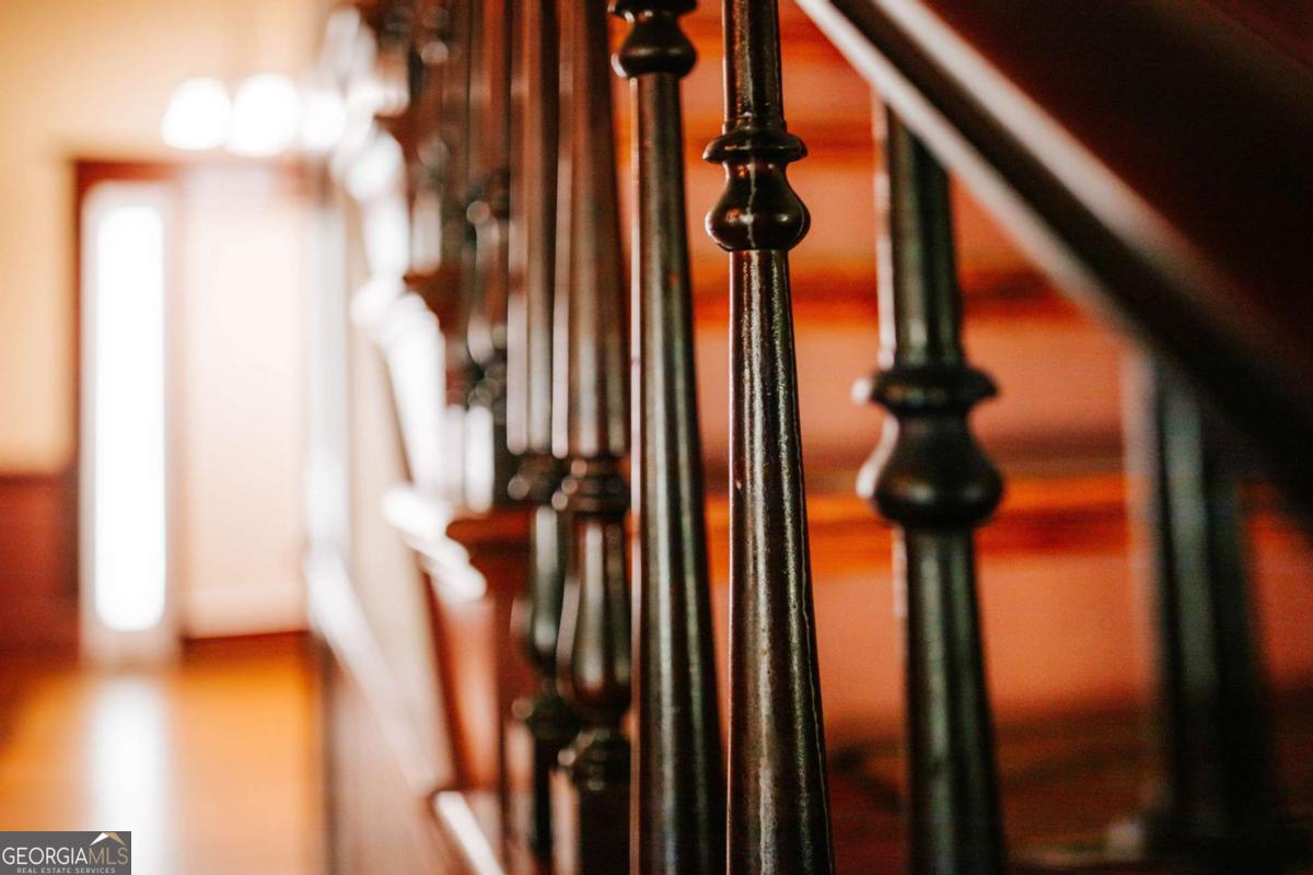 212 Yancey Road Arnoldsville, GA 30619 - Photo 18 of 50 a view of staircase with a glass door