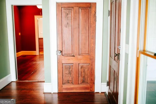 a front view of a house with a wooden floor