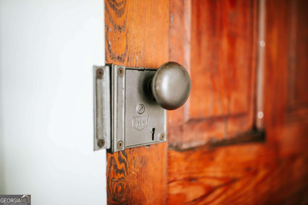 212 Yancey Road Arnoldsville, GA 30619 - Photo 29 of 50 a front view of a house with a wooden floor