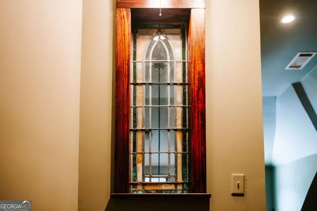 a spacious bathroom with a double vanity sink mirror and toilet