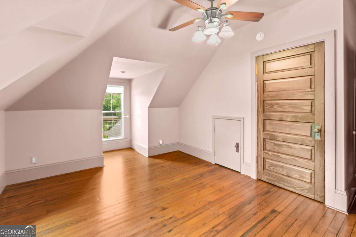 212 Yancey Road Arnoldsville, GA 30619 - Photo 40 of 50 wooden floor in an empty room with a window