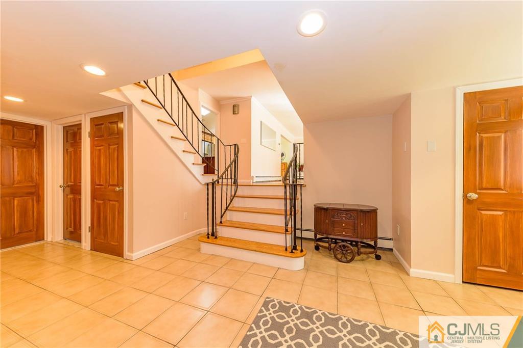 82 Jacobs Road Rockaway, NJ 07866 - Photo 2 of 25 a view of a livingroom with wooden floor and furniture