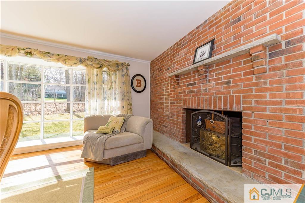 82 Jacobs Road Rockaway, NJ 07866 - Photo 11 of 25 a living room with furniture and a fireplace