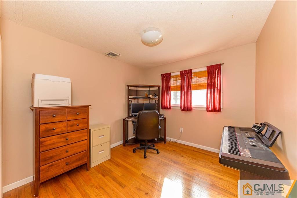 82 Jacobs Road Rockaway, NJ 07866 - Photo 20 of 25 a room with furniture and gym equipment