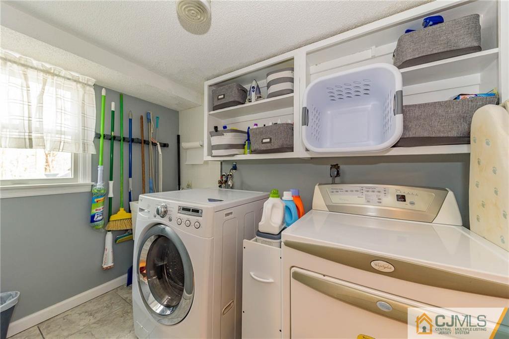 82 Jacobs Road Rockaway, NJ 07866 - Photo 9 of 25 a utility room with dryer and washer