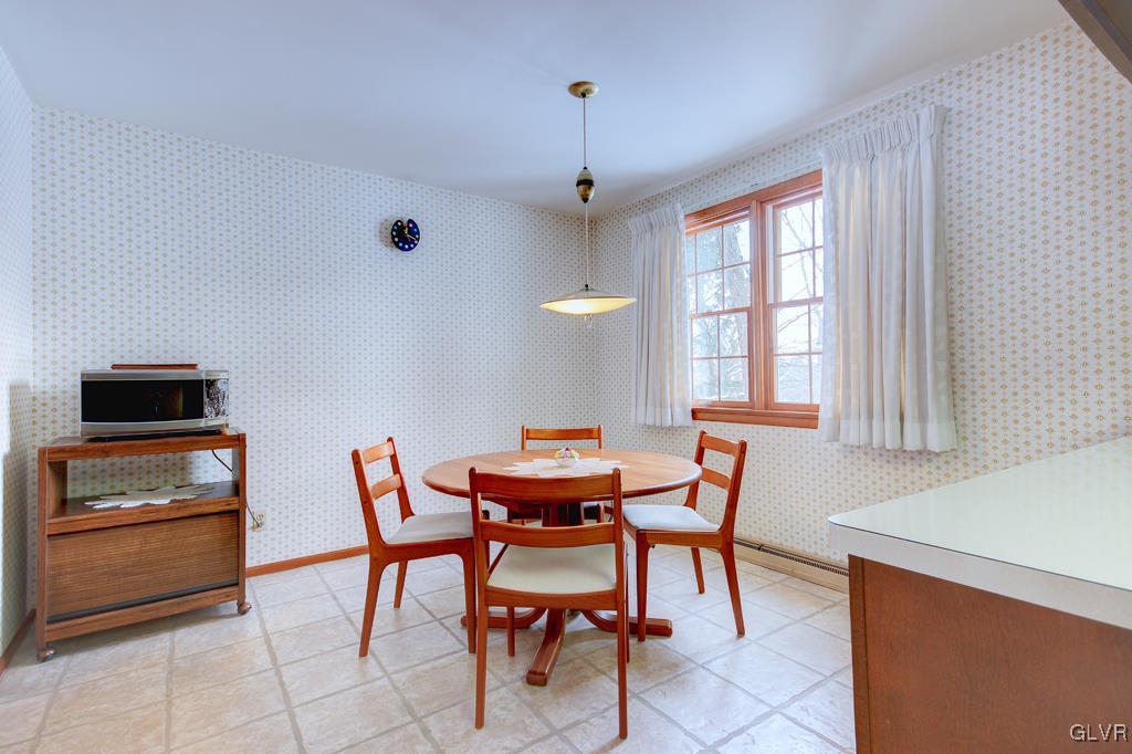 767 Yorkshire Road Bethlehem, PA 18017 - Photo 8 of 27 Breakfast Area W/View of Back Yard's Park-Like Set
