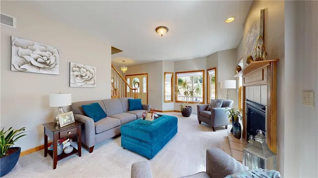 a living room with furniture or couch and a window