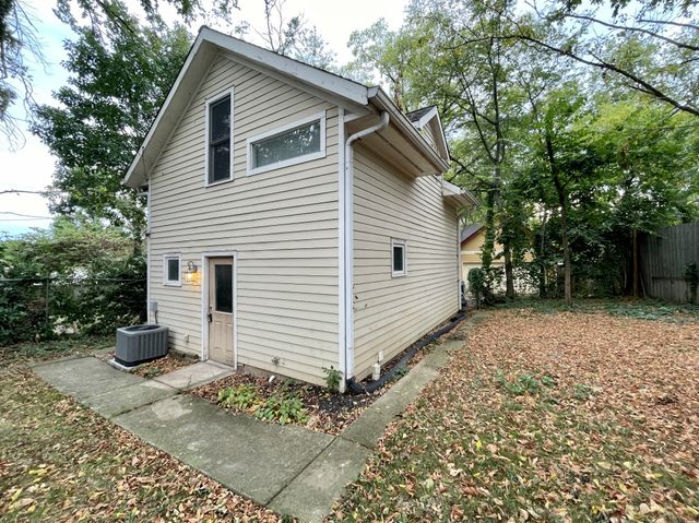 a view of a back yard of the house