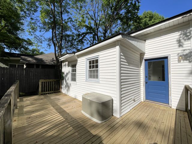 a view of backyard with cabin
