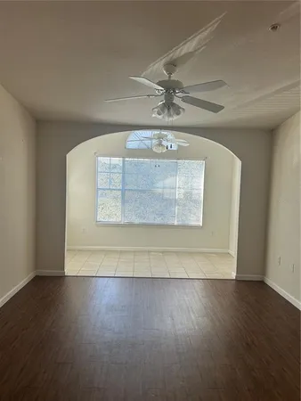 a view of a swimming pool and a yard