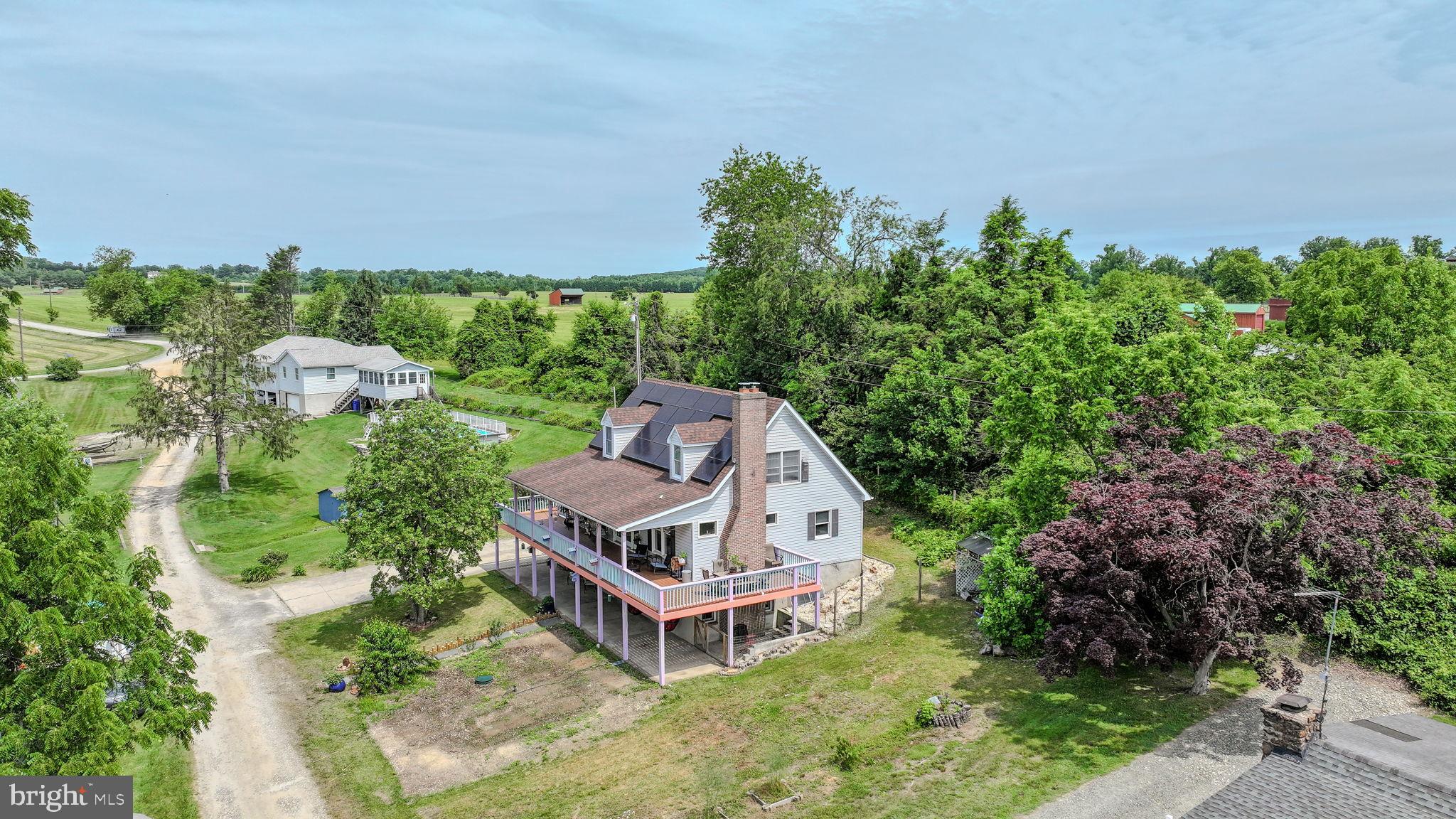210 Elk View Road North East, MD 21901 - Photo 49 of 64 an aerial view of a house with a yard and lake view