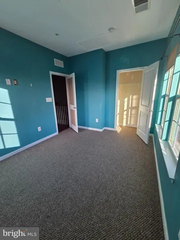 a view of a livingroom with an entryway