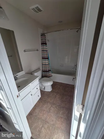 a bathroom with a sink and toilet