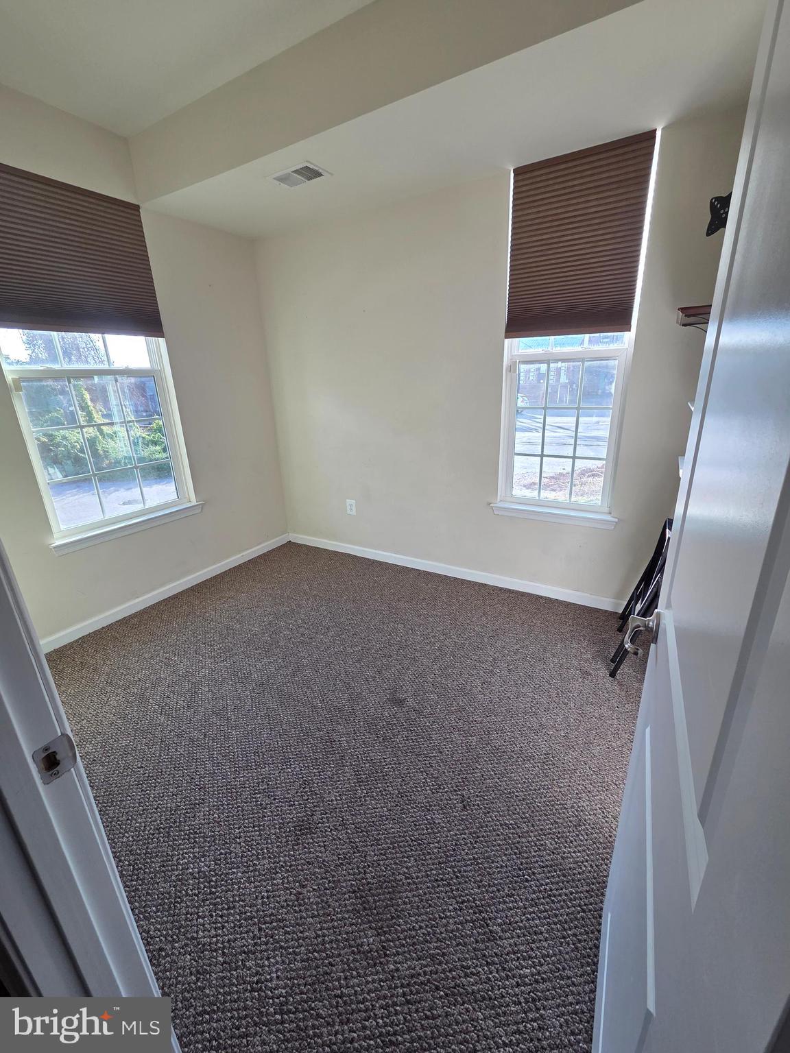 4500 Fait Avenue Baltimore, MD 21224 - Photo 6 of 28 a view of an empty room with a window