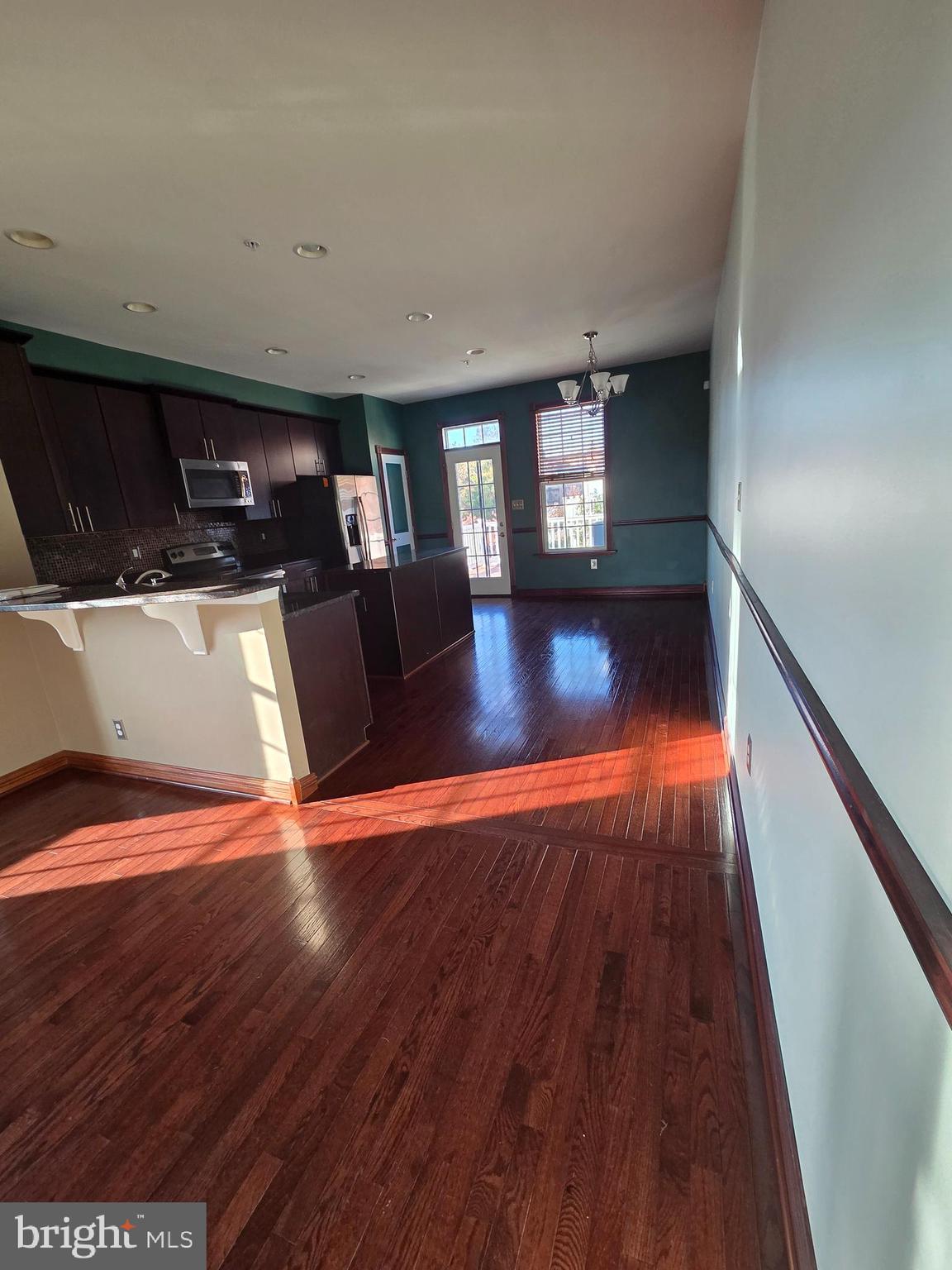 4500 Fait Avenue Baltimore, MD 21224 - Photo 8 of 28 a view of livingroom with furniture wooden floor and window
