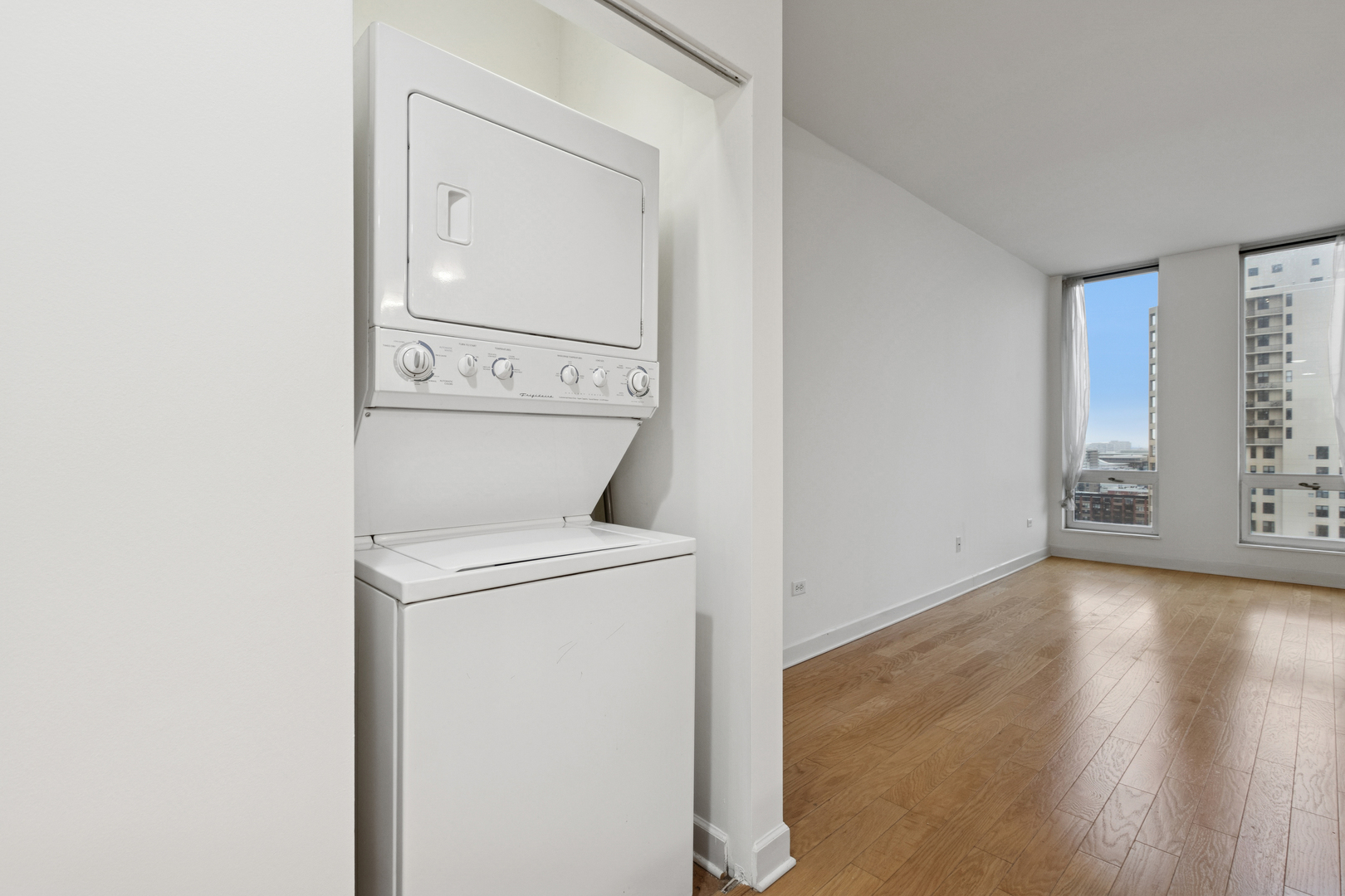 1400 South Michigan Avenue, Unit 1708 Chicago, IL 60605 - Photo 17 of 20 a view of storage and utility room with closet and wooden floor