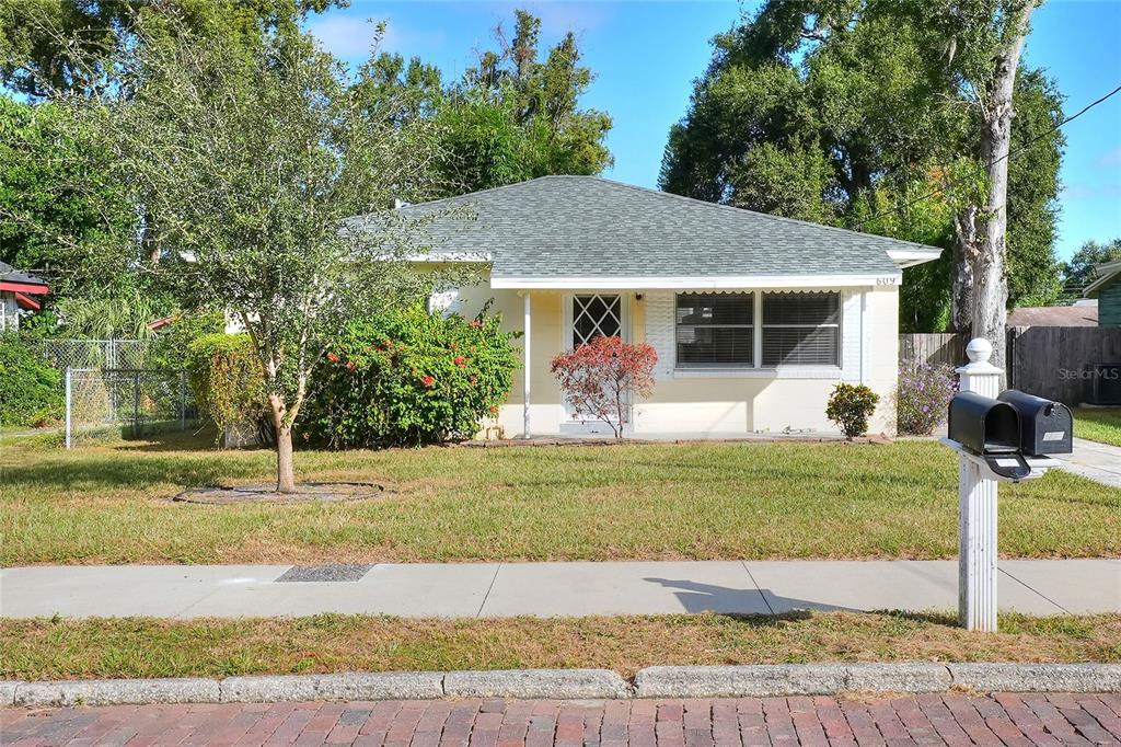 609 West Park Street Lakeland, FL 33803 - Photo 2 of 30 a view of a house with backyard and trees