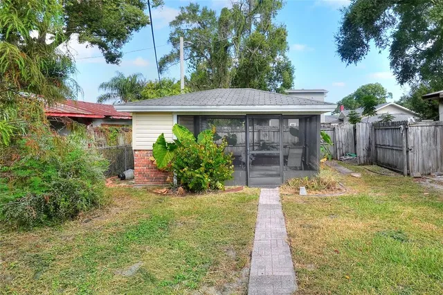 a view of a backyard with plants