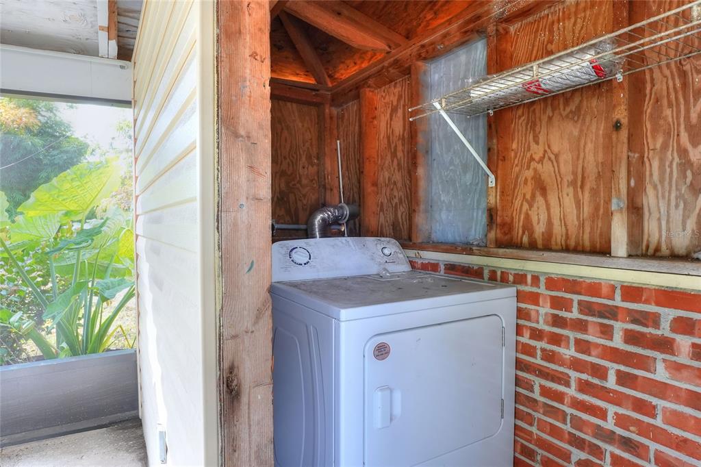 609 West Park Street Lakeland, FL 33803 - Photo 24 of 30 a bathroom with a sink and a mirror