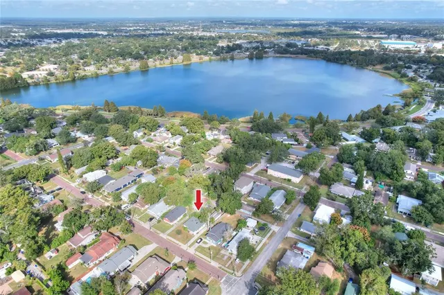 an aerial view of residential building and lake view