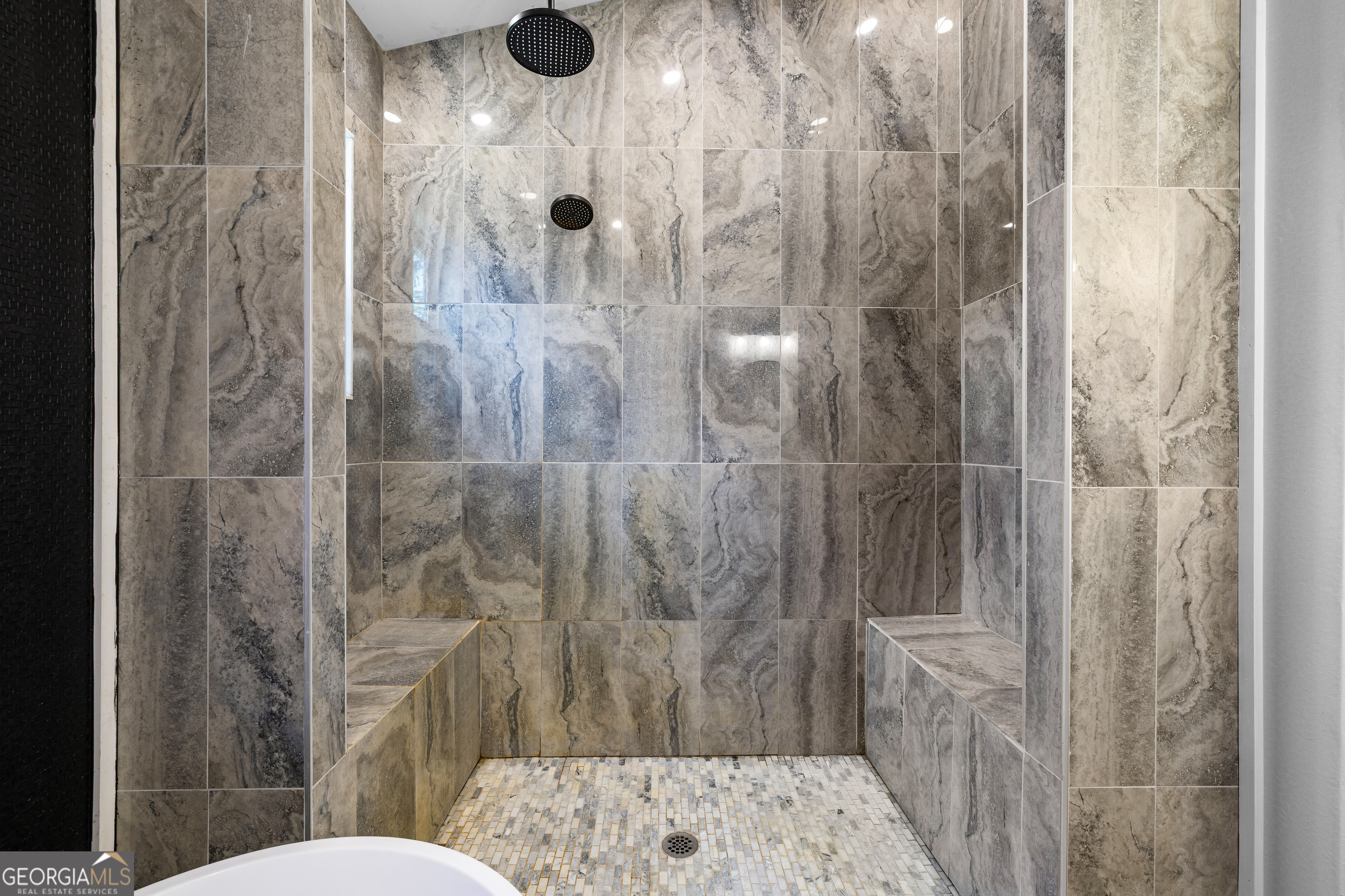 1329 Standing Rock Road Senoia, GA 30276 - Photo 20 of 77 a bathroom with a shower and a toilet