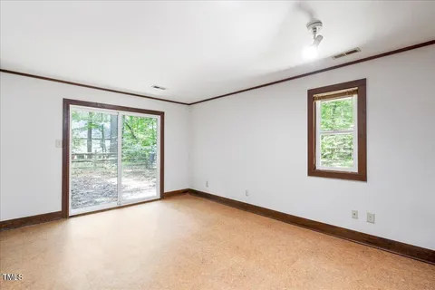 an empty room with windows