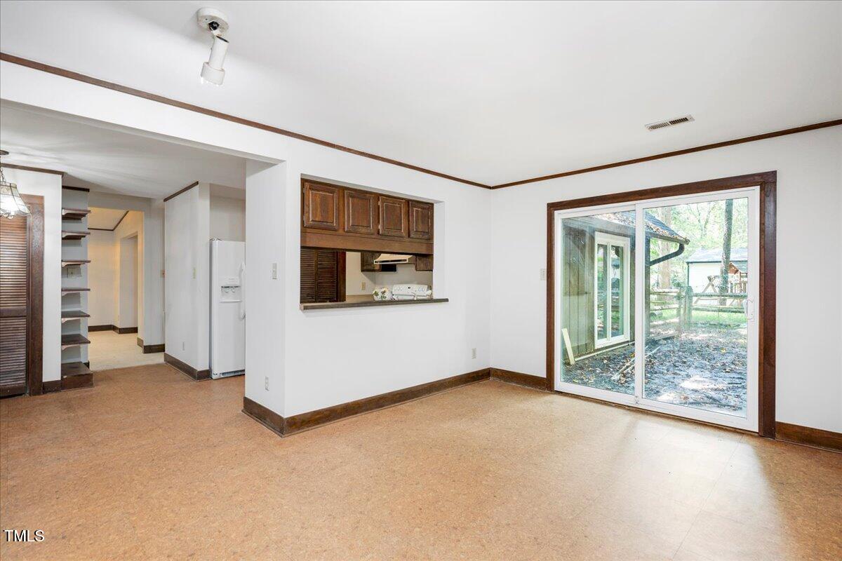 11637 Appaloosa Run West Raleigh, NC 27613 - Photo 14 of 29 an empty room with windows
